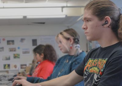 students working on computer