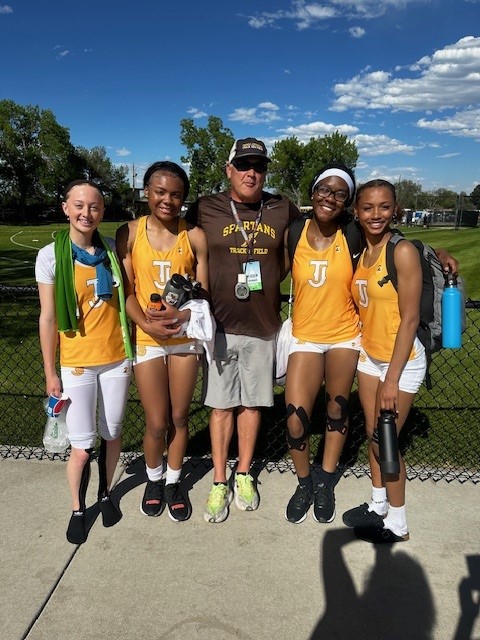 Track team with coach