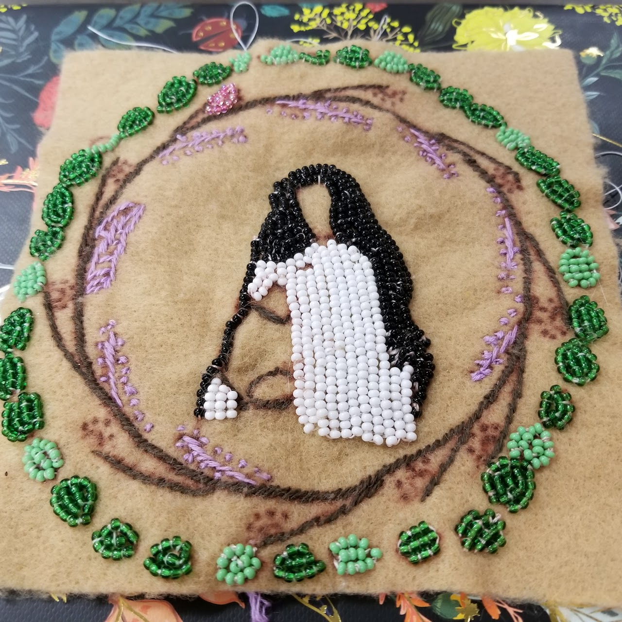 bead art of pregnant woman