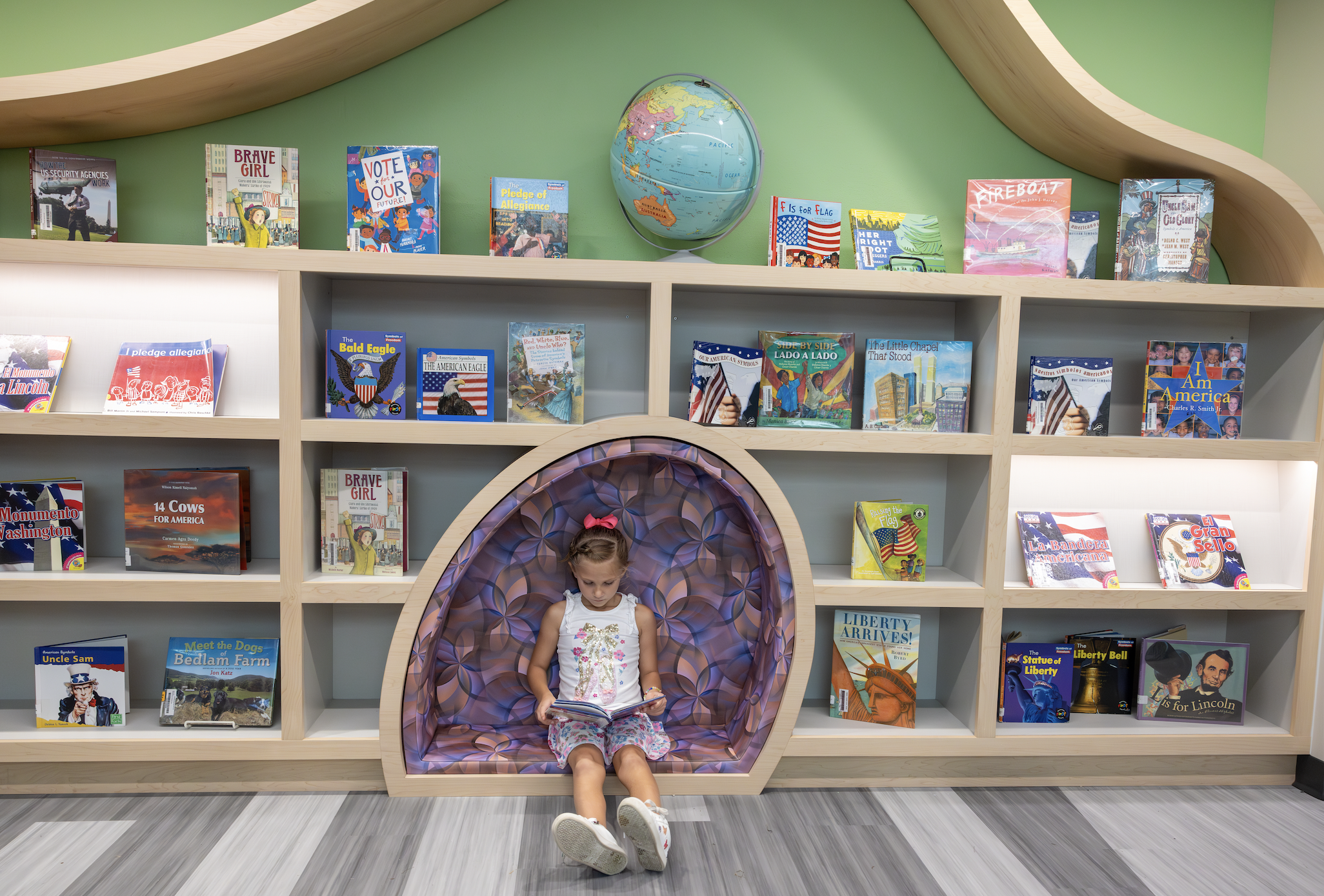 Student Reading in the Fischer Library Media Center