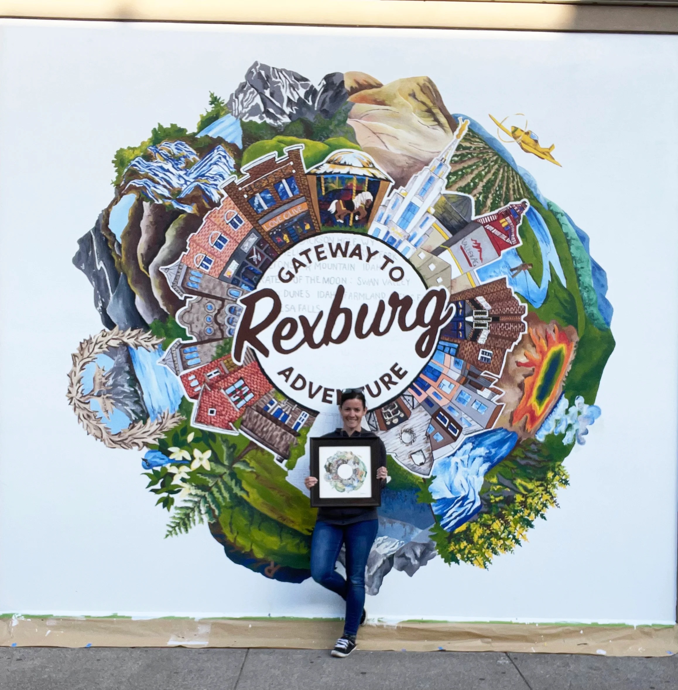 Woman standing in front of Rexburg ID mural