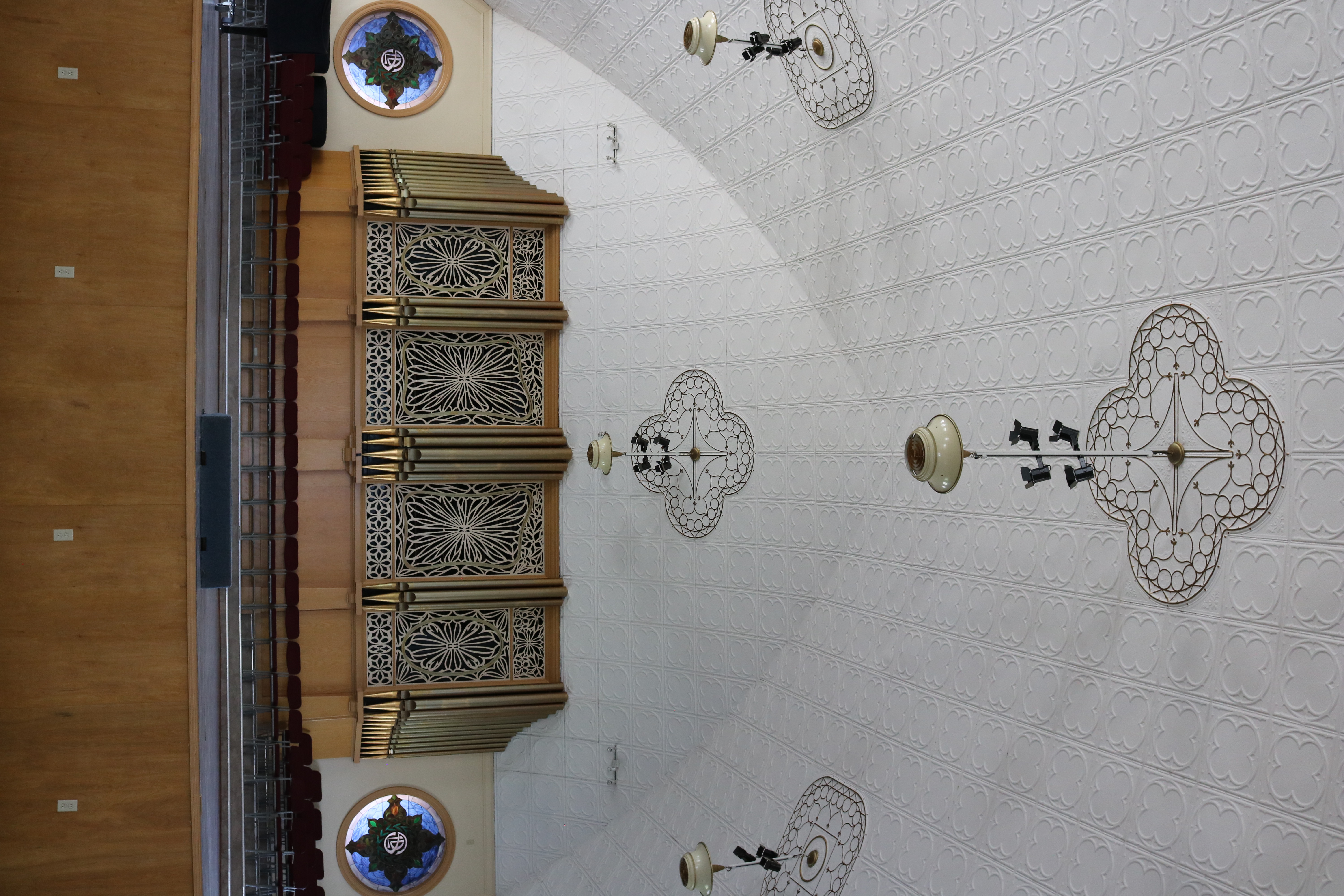 interior performance hall of the tabernacle from the bottom of the stage, also shows intricate ceiling designs