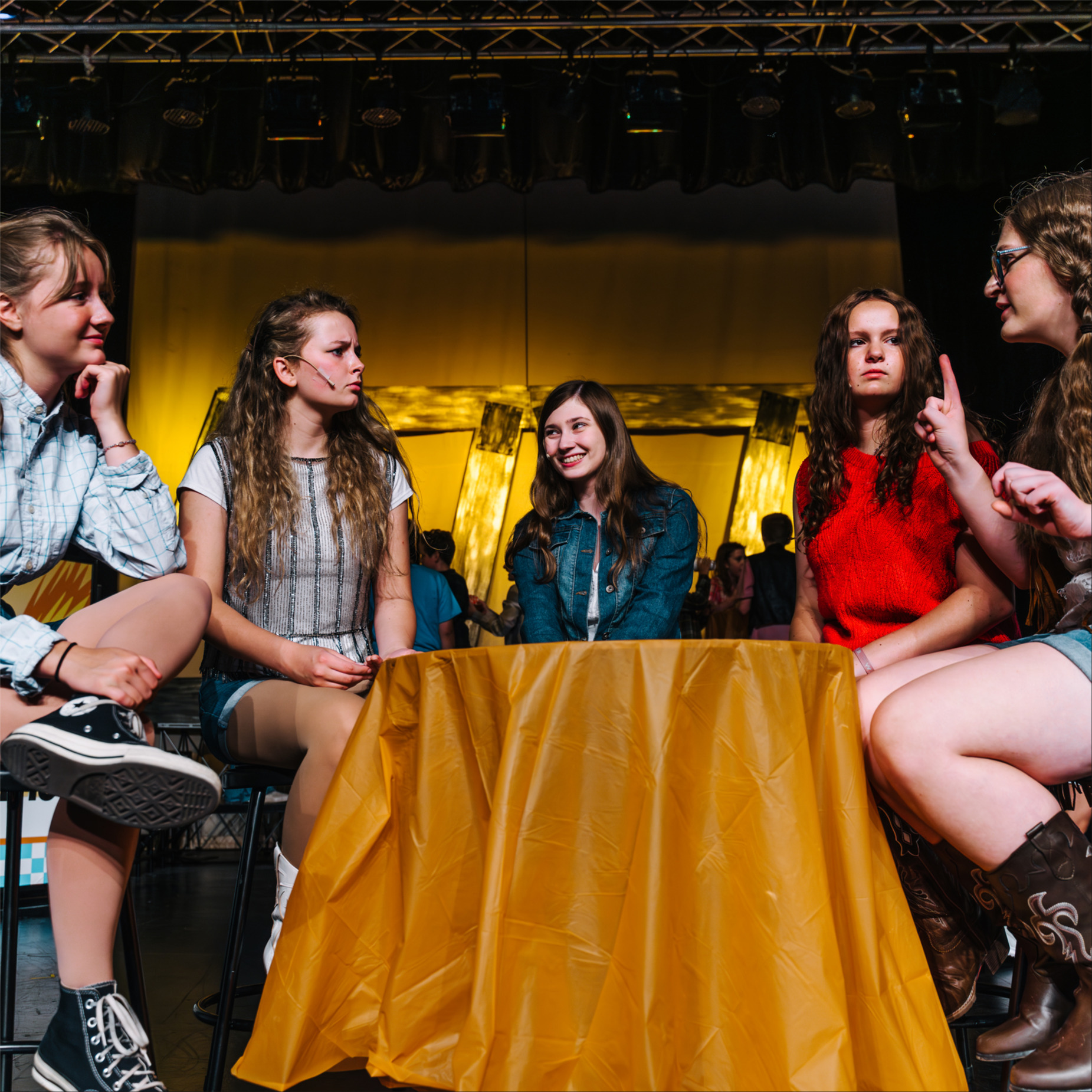 "Community Theater" photo with female actors on stage