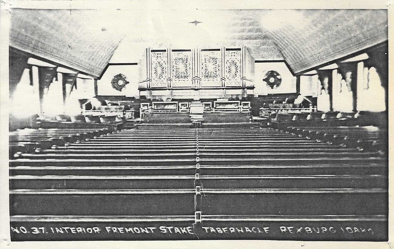 Old B&W photo of the interior of the Tabernacle. "No. 37 interior Fremont Stake Tabernacle Rexburg Idaho" is written on the bottom.