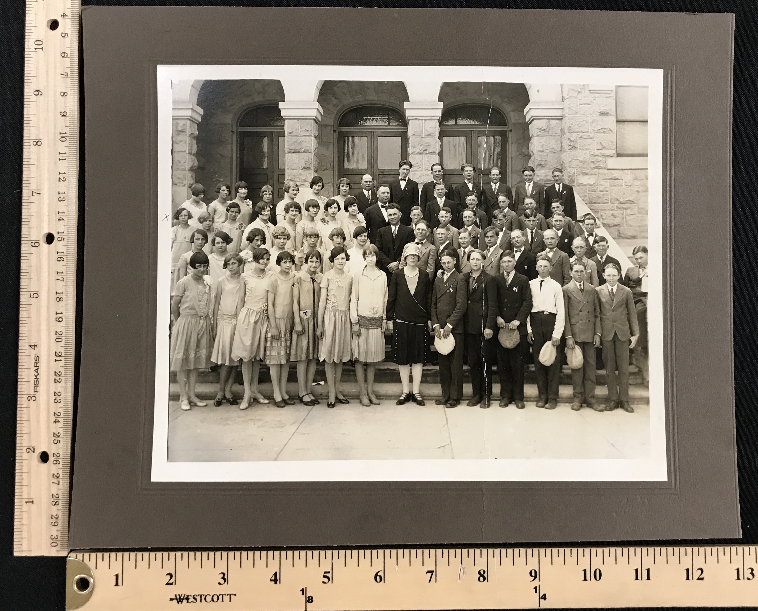 old Sepia photo of 8th grad graduation class from 1927 on the steps of the Tabernacle. 