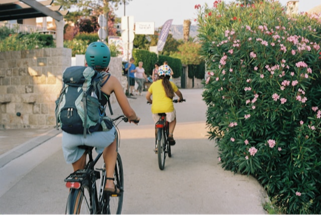 Photo of family riding bikes 