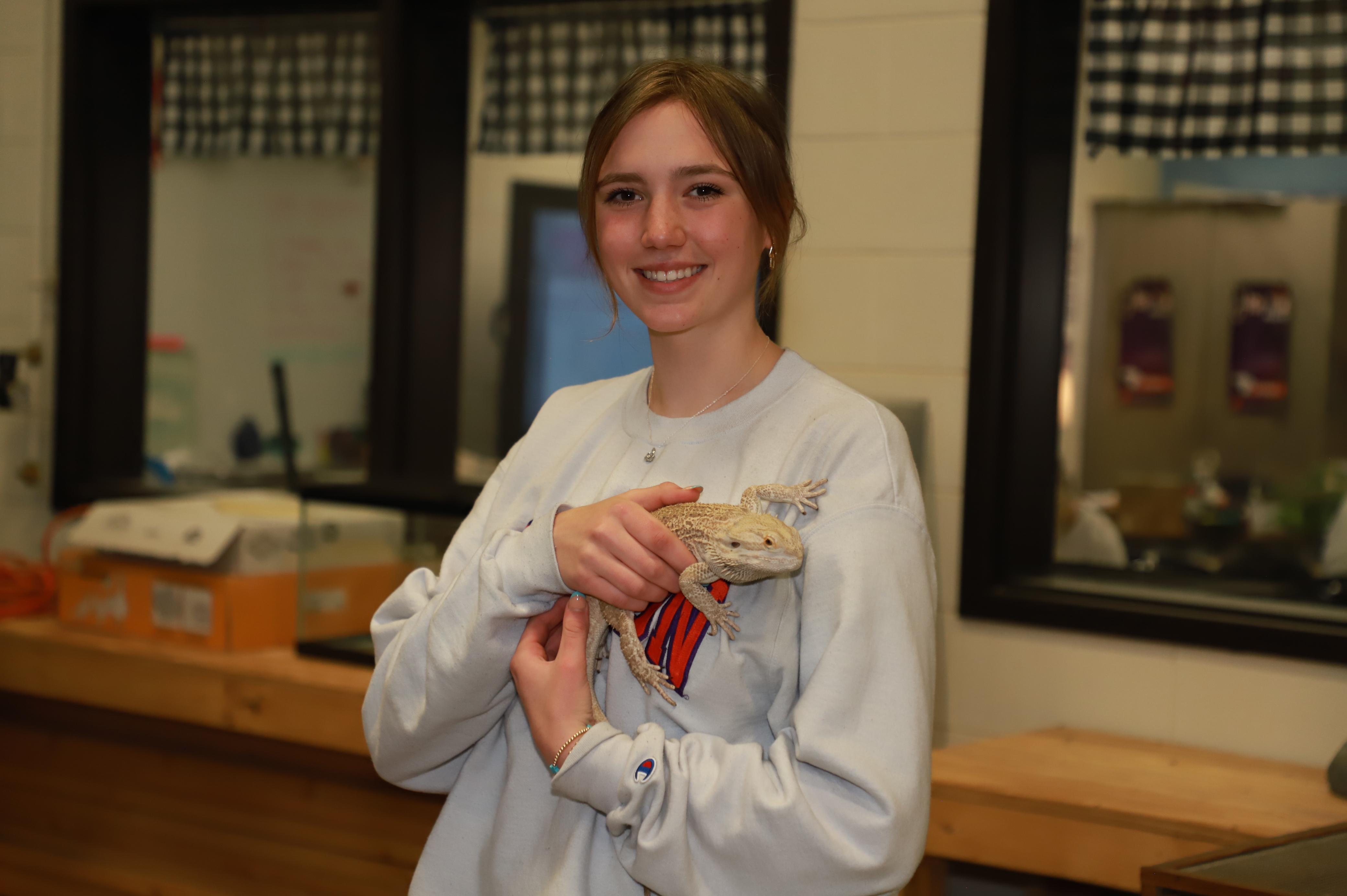 Student with lizard