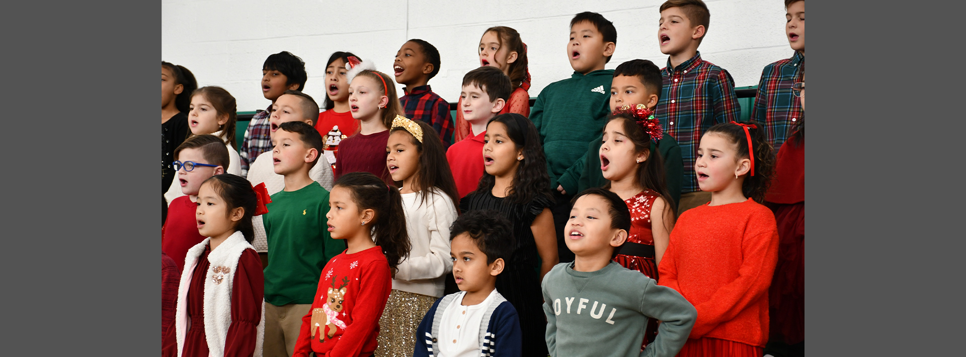 students caroling for the holidays