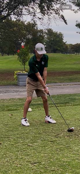 Carle Place student playing golf.