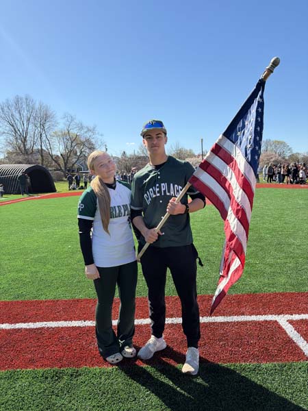Students holding flag.