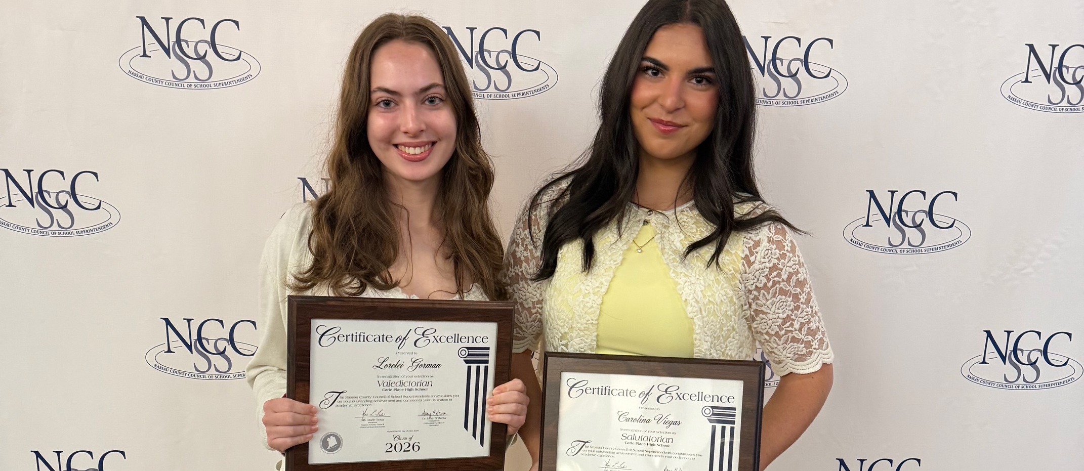 Students holding awards.
