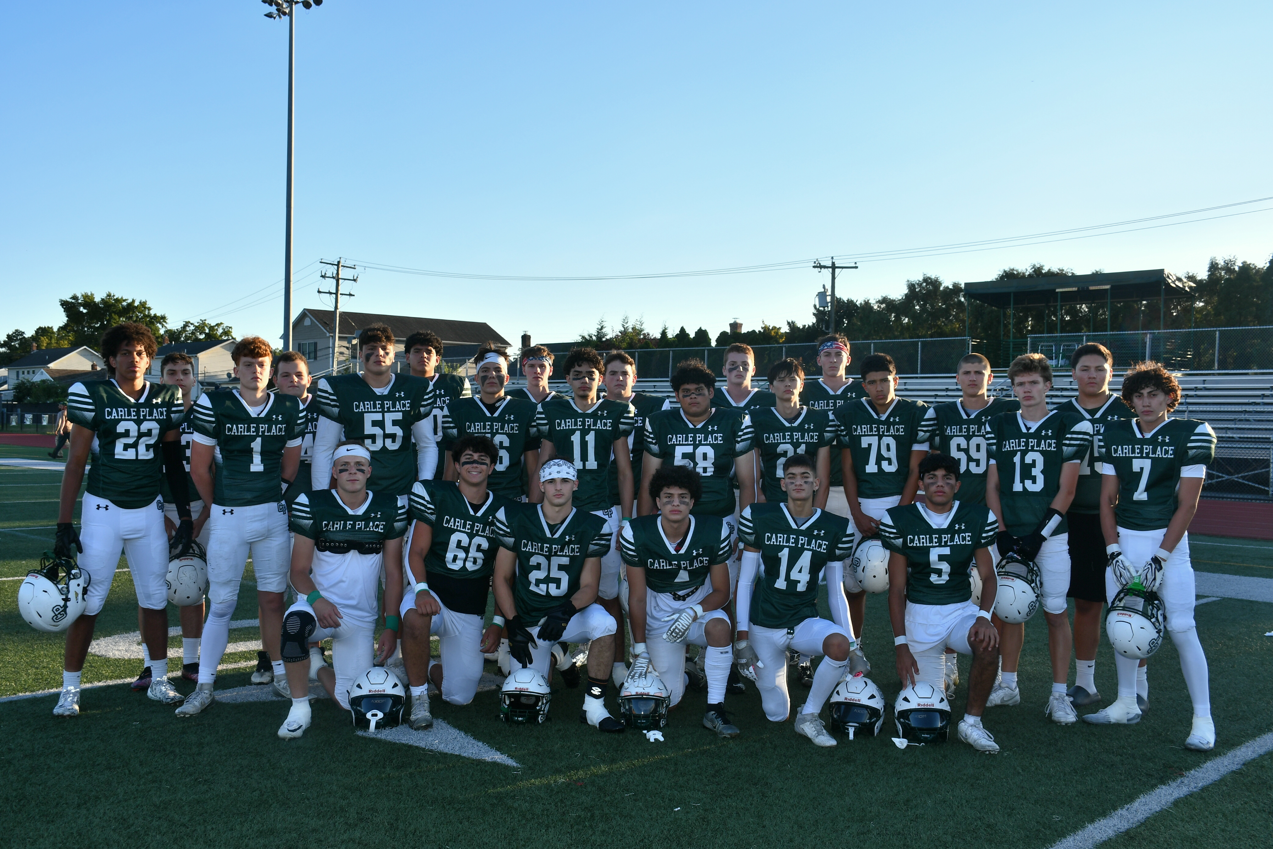 Student football players during homecoming game.