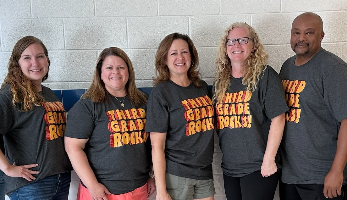 Third Grade staff smiling