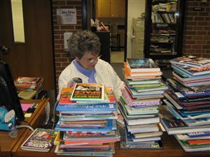 teacher with books