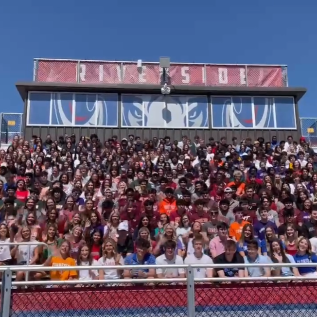 students seated in stadium