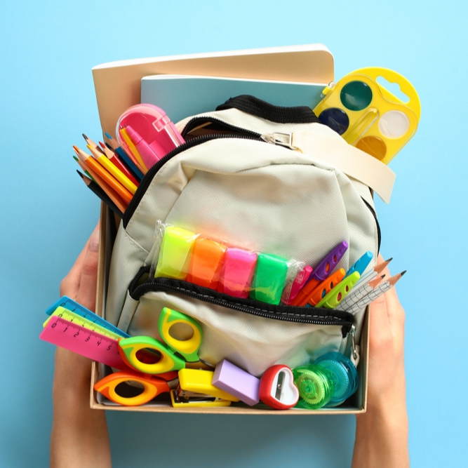 A backpack full of school supplies.