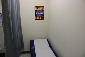 clinic bed with a sheet on top