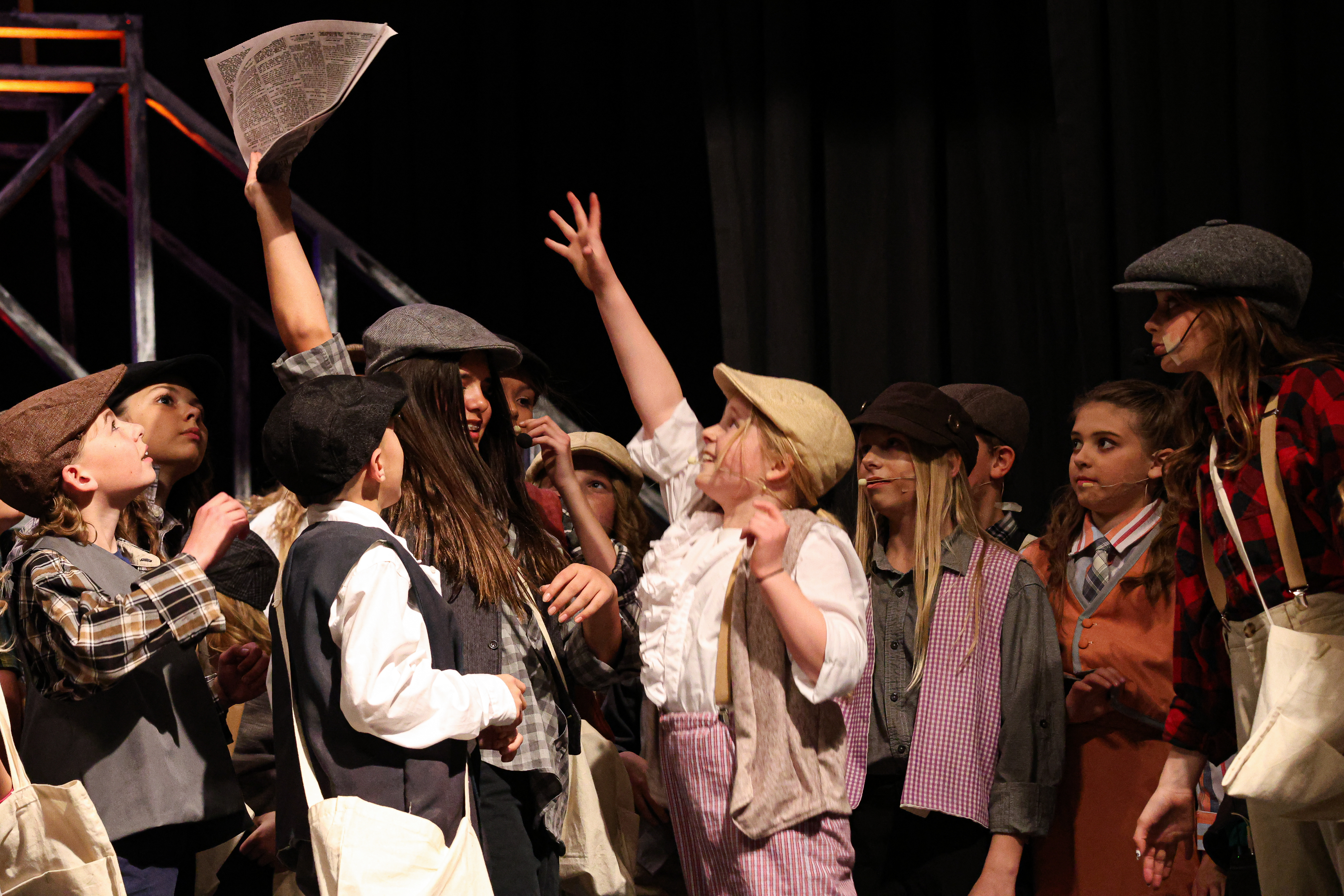 Students performing Newsies