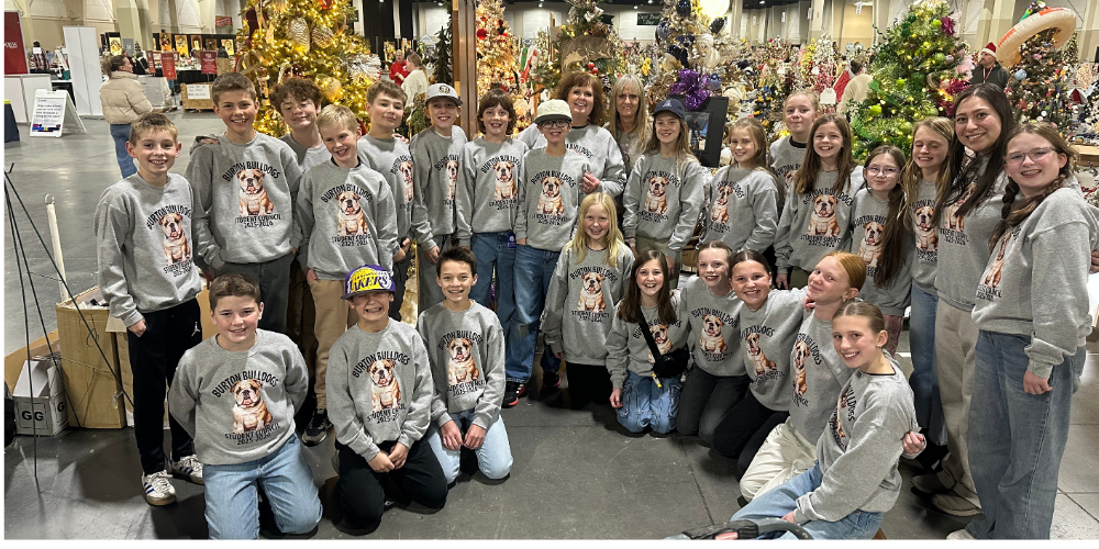 students with Christmas tree