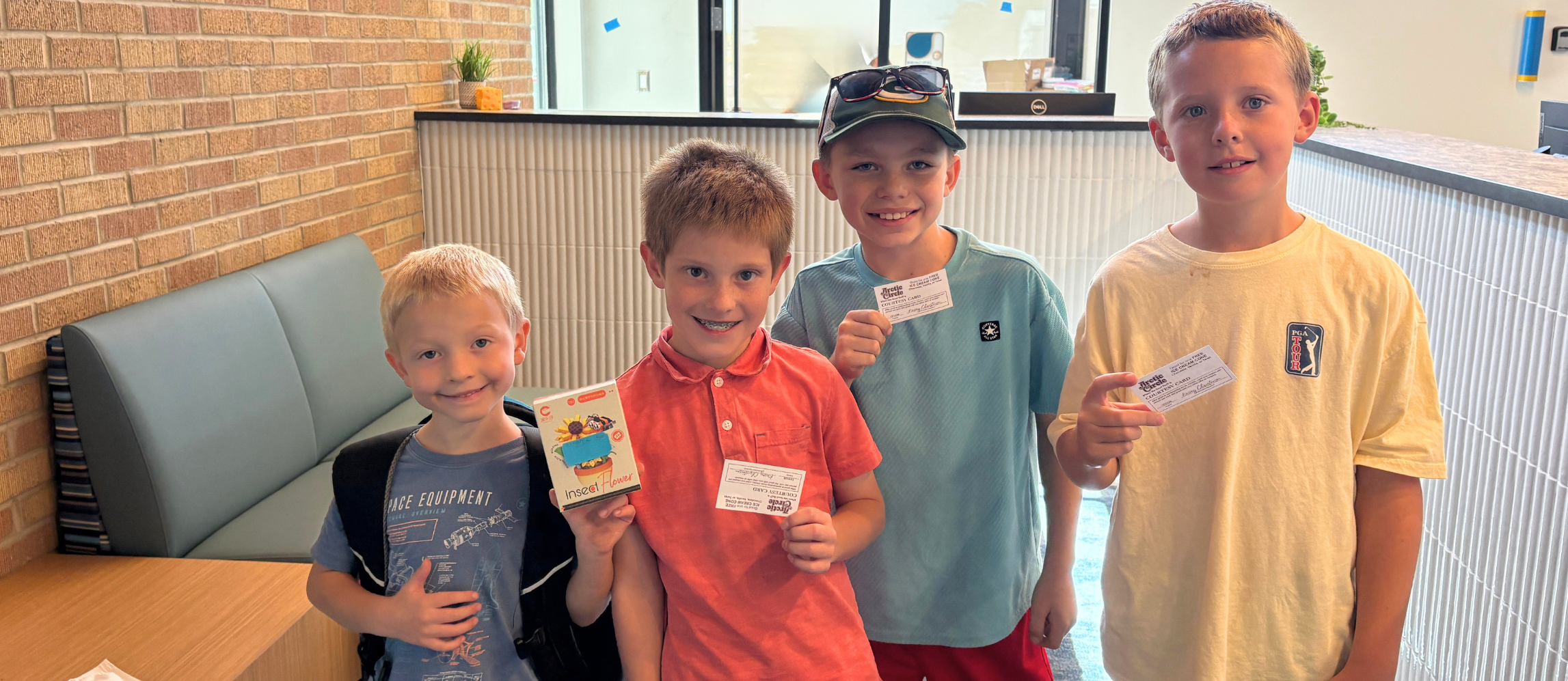 Students pose with prizes