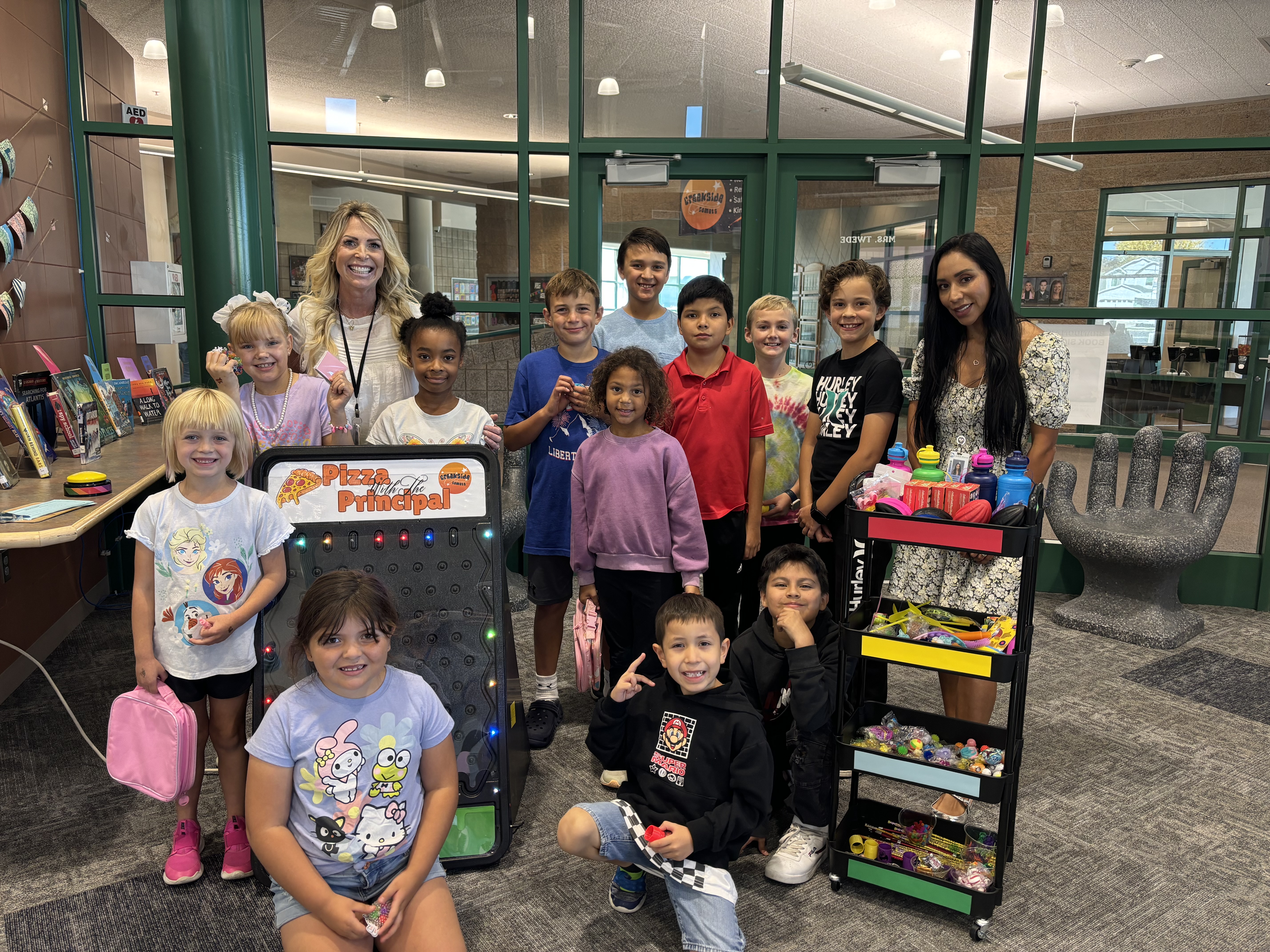 kids in the library with principals