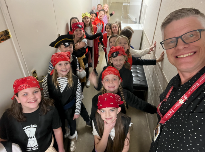 3rd grade students backstage at the UMOCA