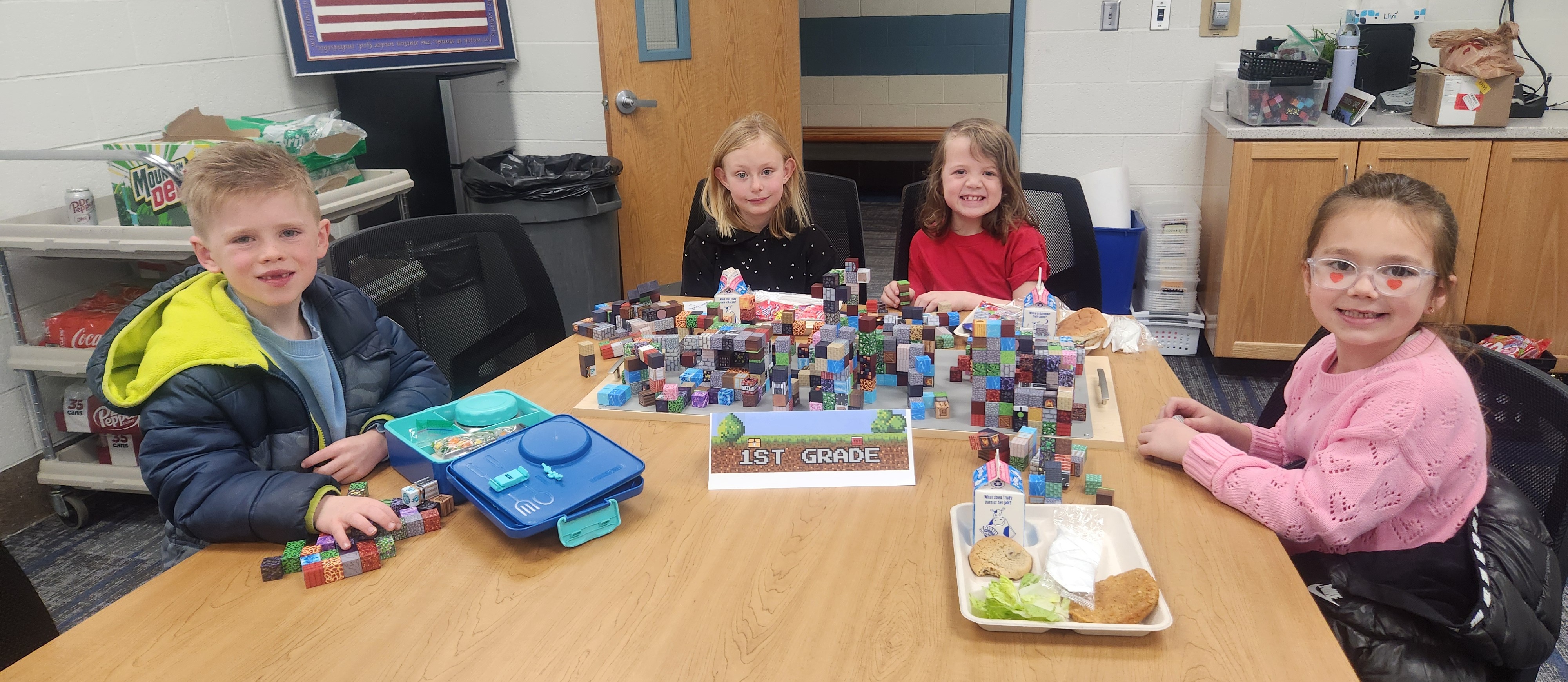 1st grade students during lunch building with minecraft blocks