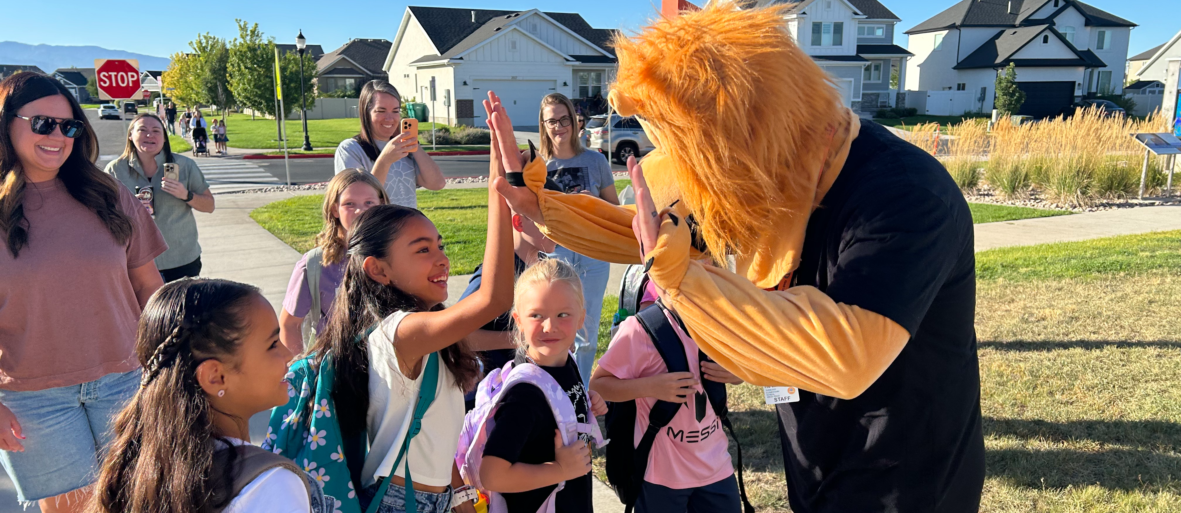 Lion mascot with students image