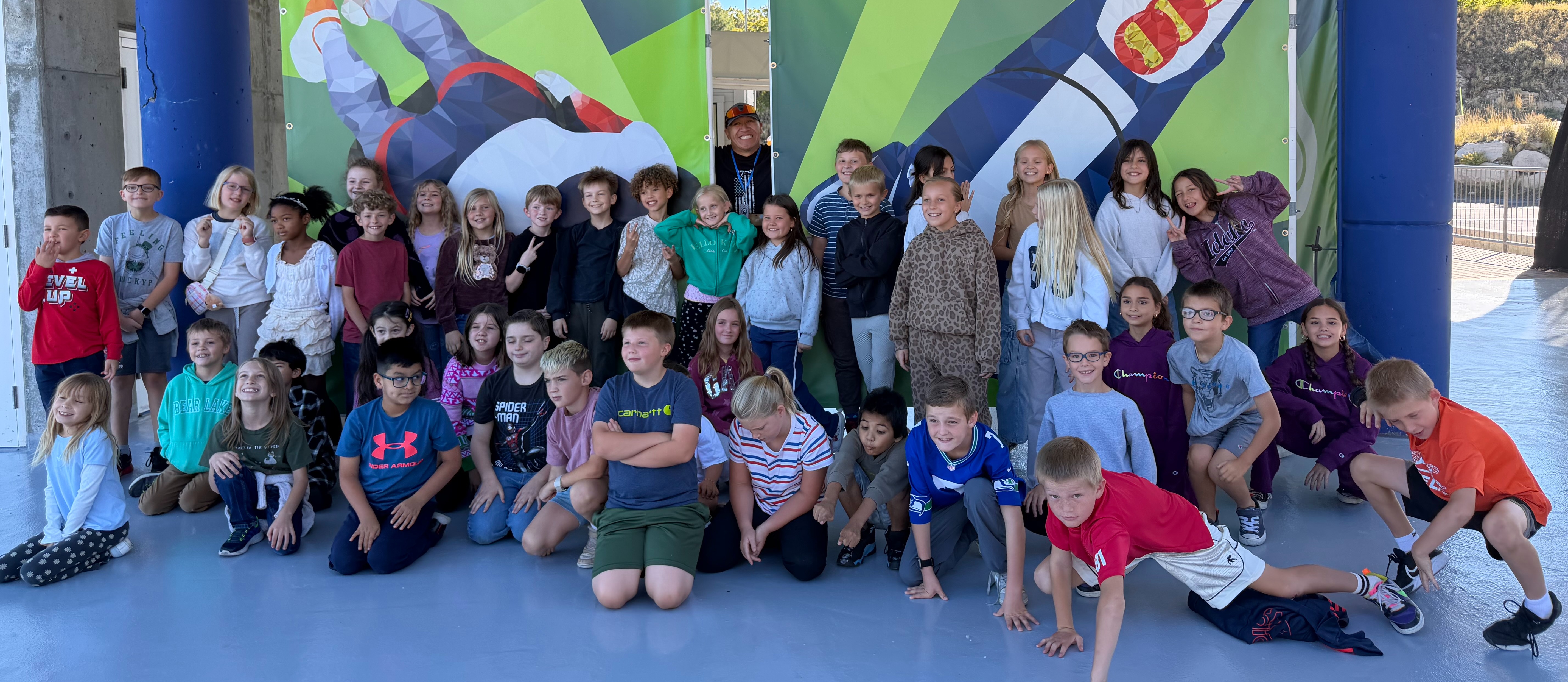 group of students in front of ski display at ski museum