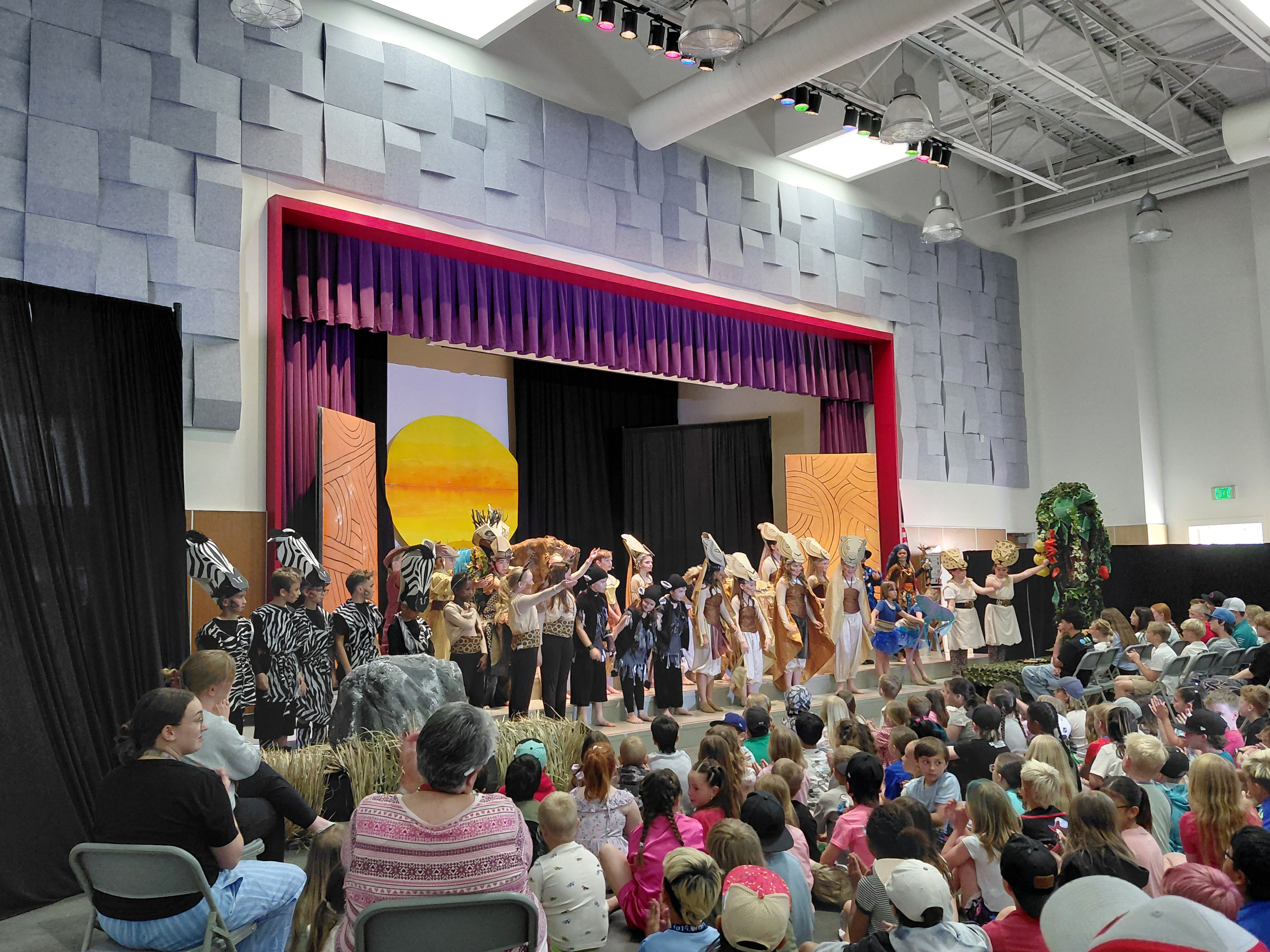 Performance of the Lion King Jr play. All students doing their bows. 