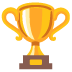 The image appears to be a trophy. It is gold in color and has a  vase-like  base that widens  towards the top. Sitting on top of the base is a  rounded cup-like  section.  Two handles extend outwards from the base on either side.