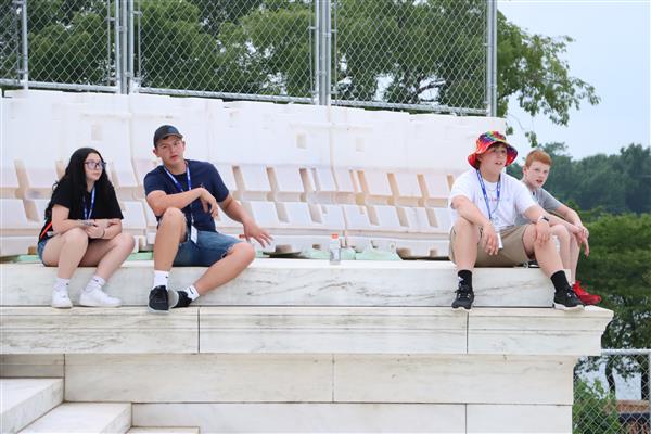 3 boys taking photo