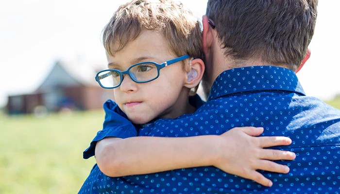 boy-hugging-father