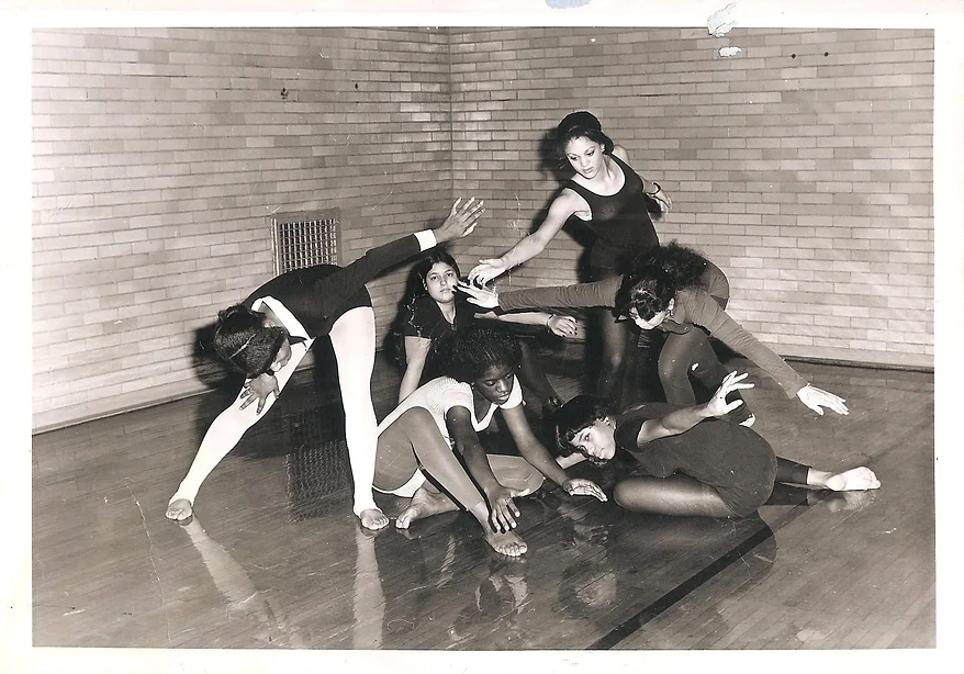 1970s black and white photo of five women performing interpretive dance