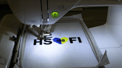 HSFI "A century of style" Slogan GIF. Video of Sewing Machine embroidering the HSFI logo