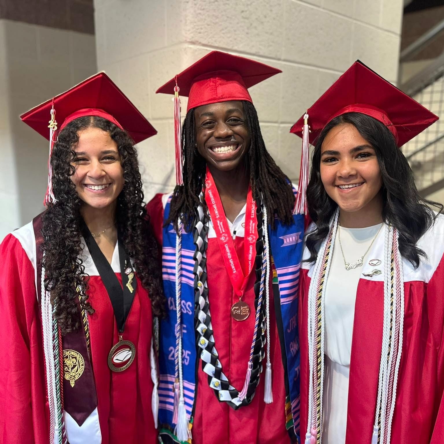 Photo of three CV graduates