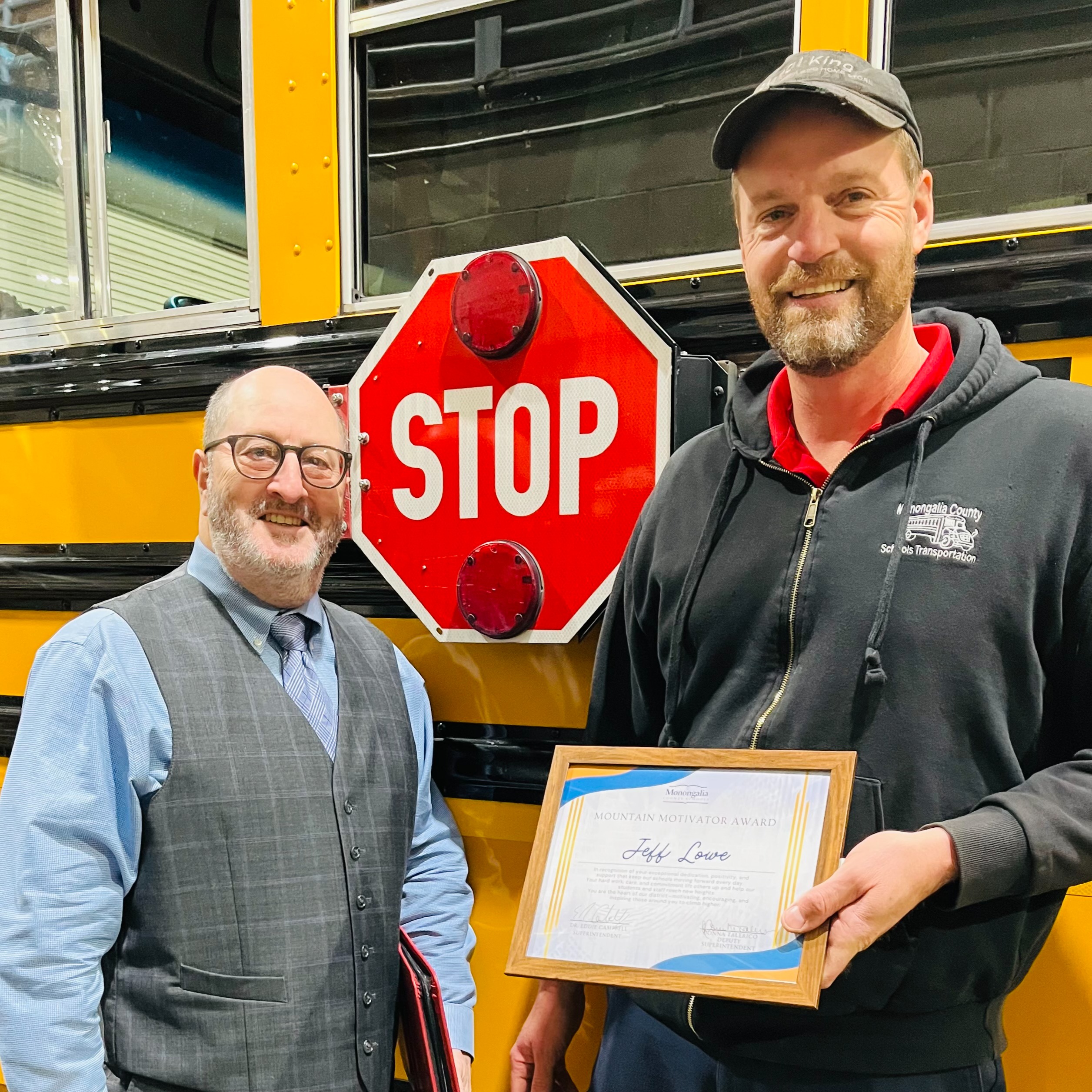 Dr. Campbell presenting our Mountain Motivator award to Jeff Lowe in the transportation office