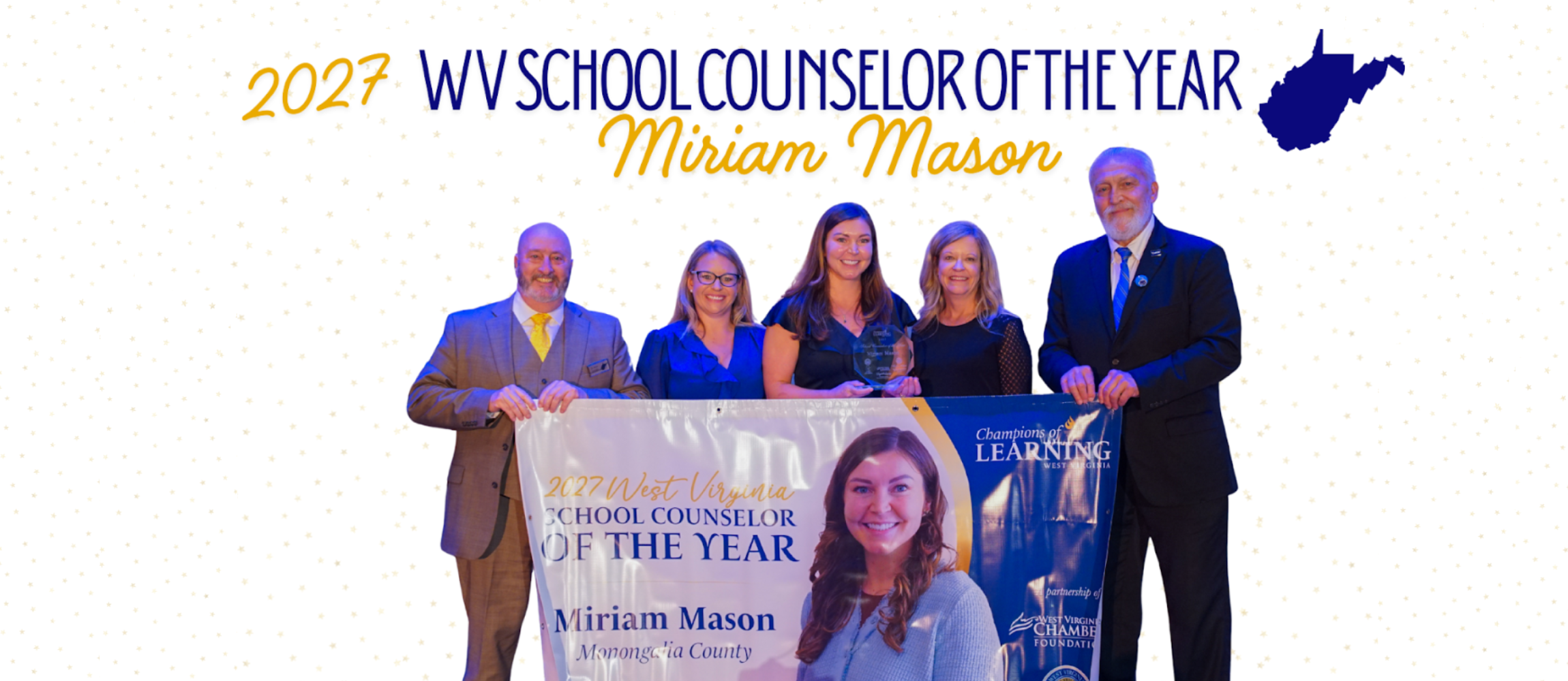 2027 WV School Counselor of the Year Miriam Mason with Dr. Campbell and state officials holding her banner