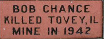 A brick plaque commemorating Bob Chance, killed in the line of duty at Topeka, Kansas in 1942.