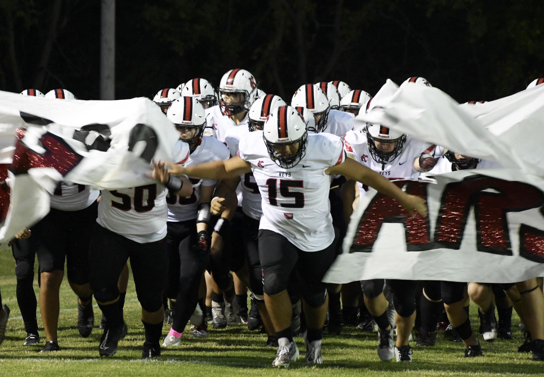 football players happy after winning