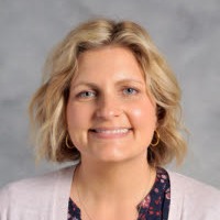 woman wearing denim jacket