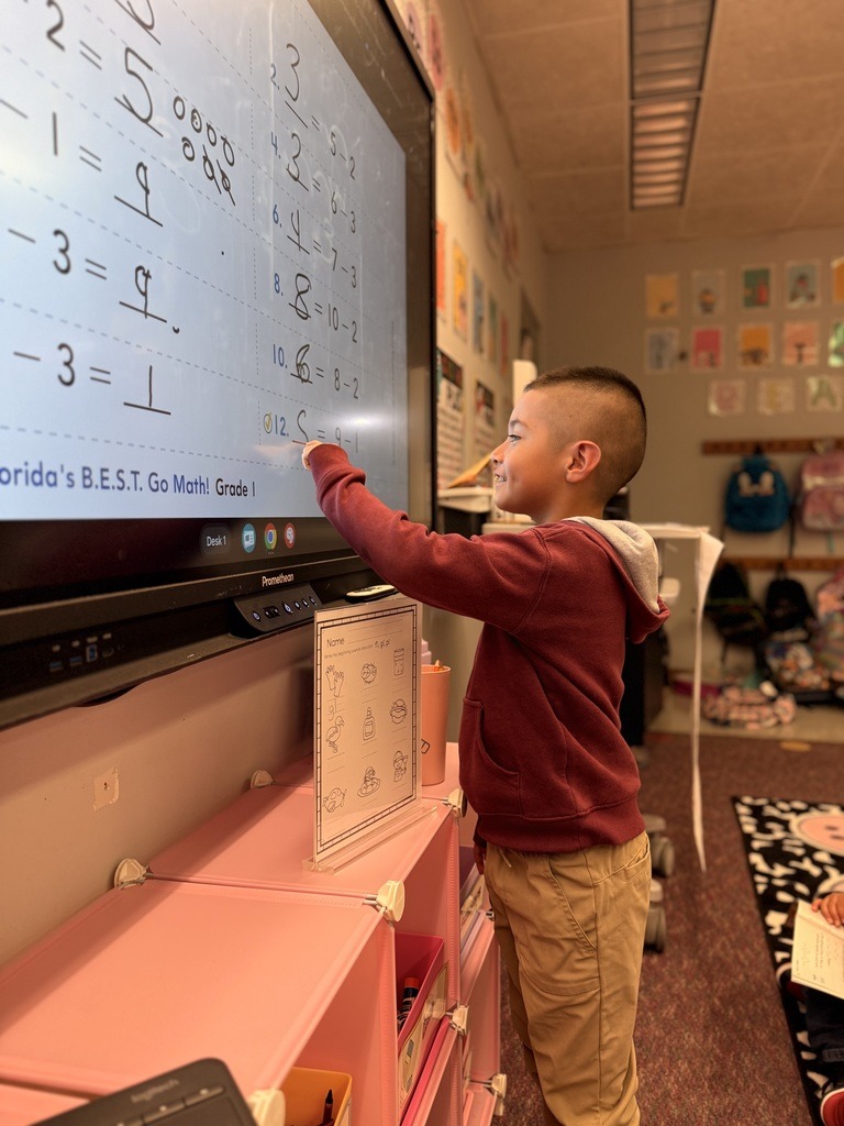 student working on the board