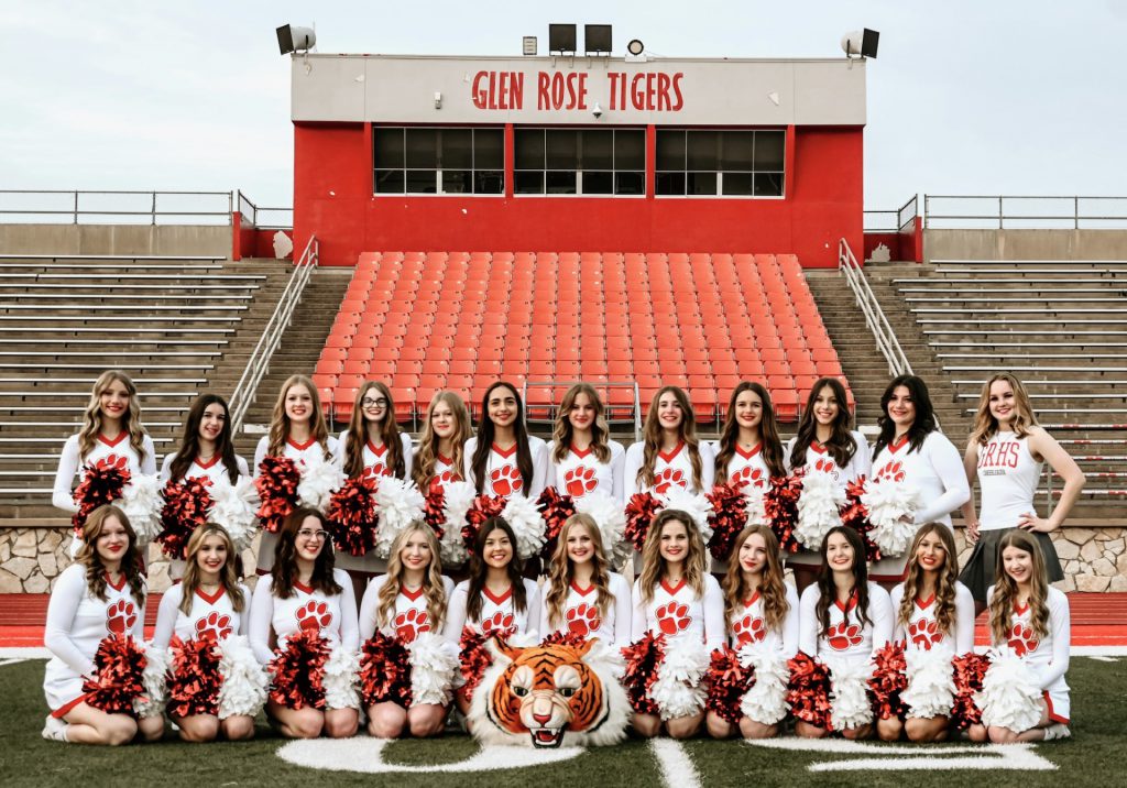 cheerleaders team members with their uniforms