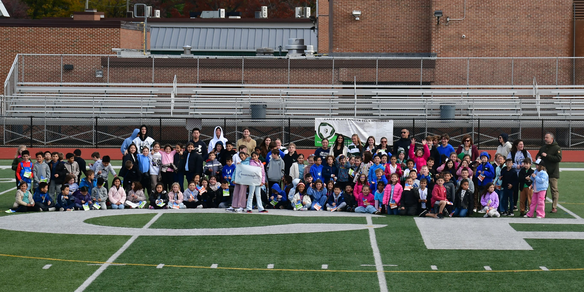 students outdoors on field