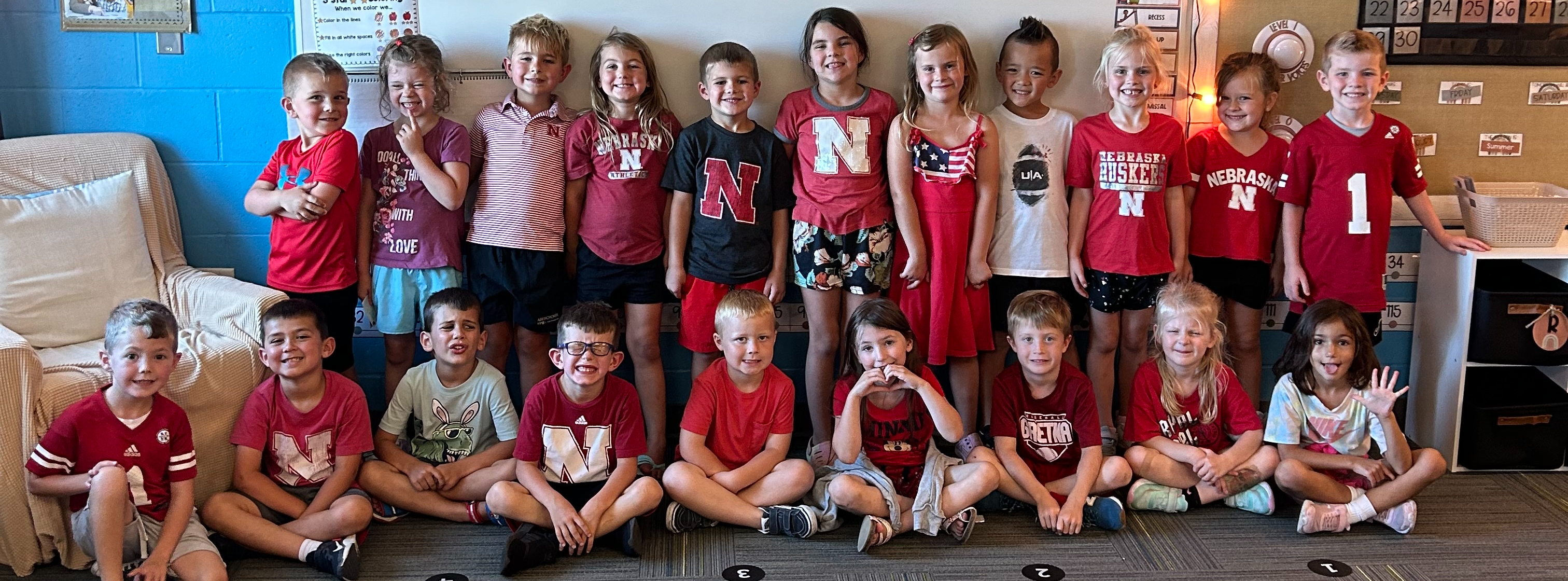 Kindergarten students dressed in their Husker gear