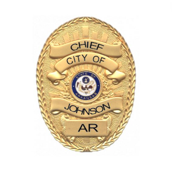 The image show a patrol car with a police badge on the door. The badge  has the words "City of Chester" written around the outside. It also has an image of an eagle in the center and a star at the bottom.