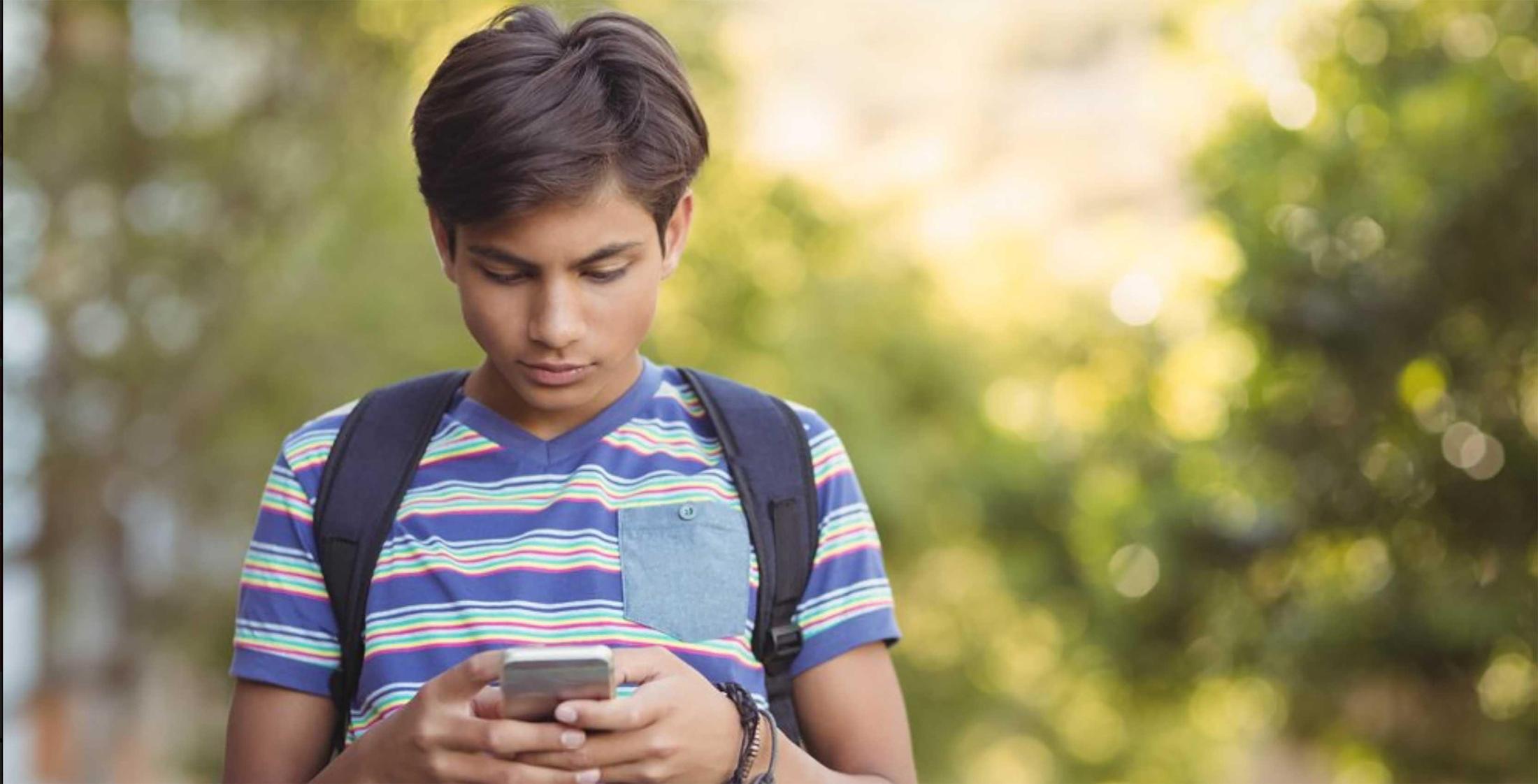 kid on his phone