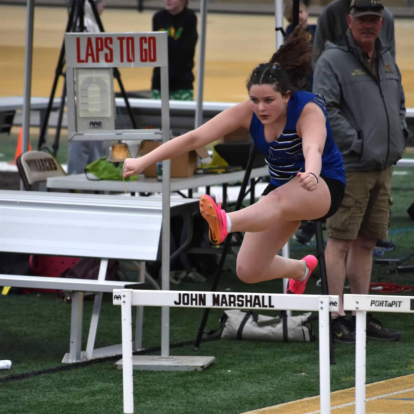 student hurdling