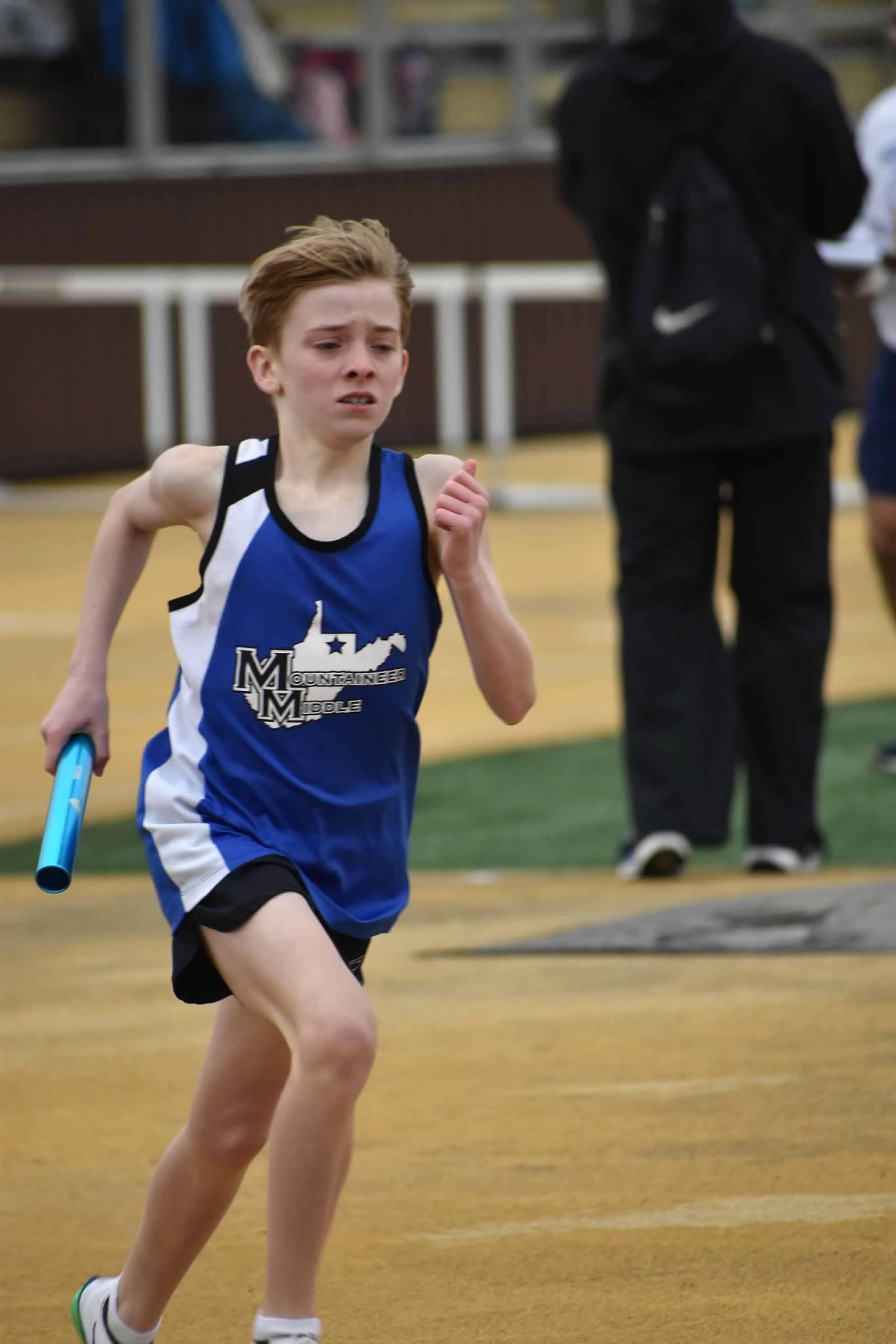 boy running relay