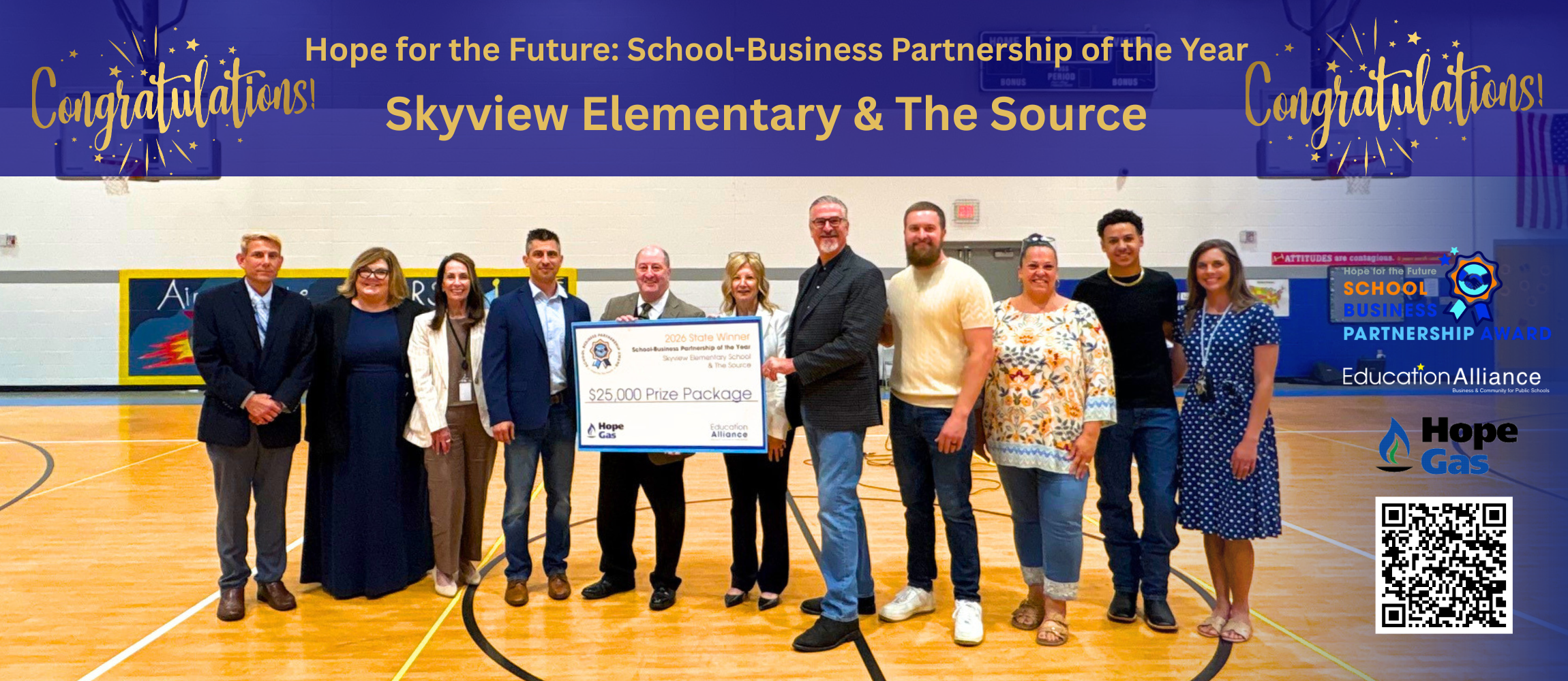 Board of Education, Skyview Elementary and Source Leadership standing with $25,000 check for winning "Hope for the Future: School-Business Partnership of the Year Award